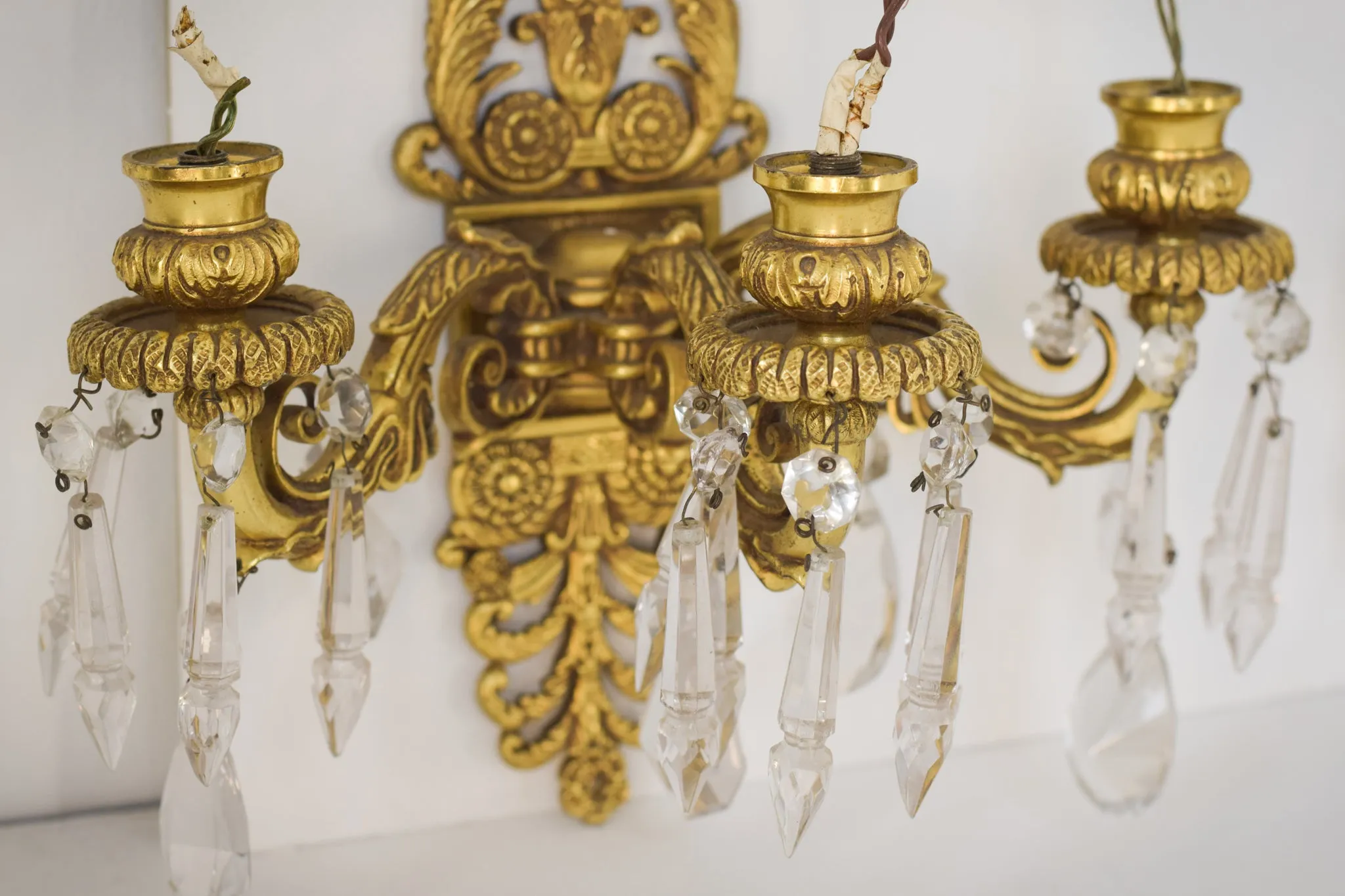 Two - Bronze and Cut Glass Wall-Mounted Chandeliers