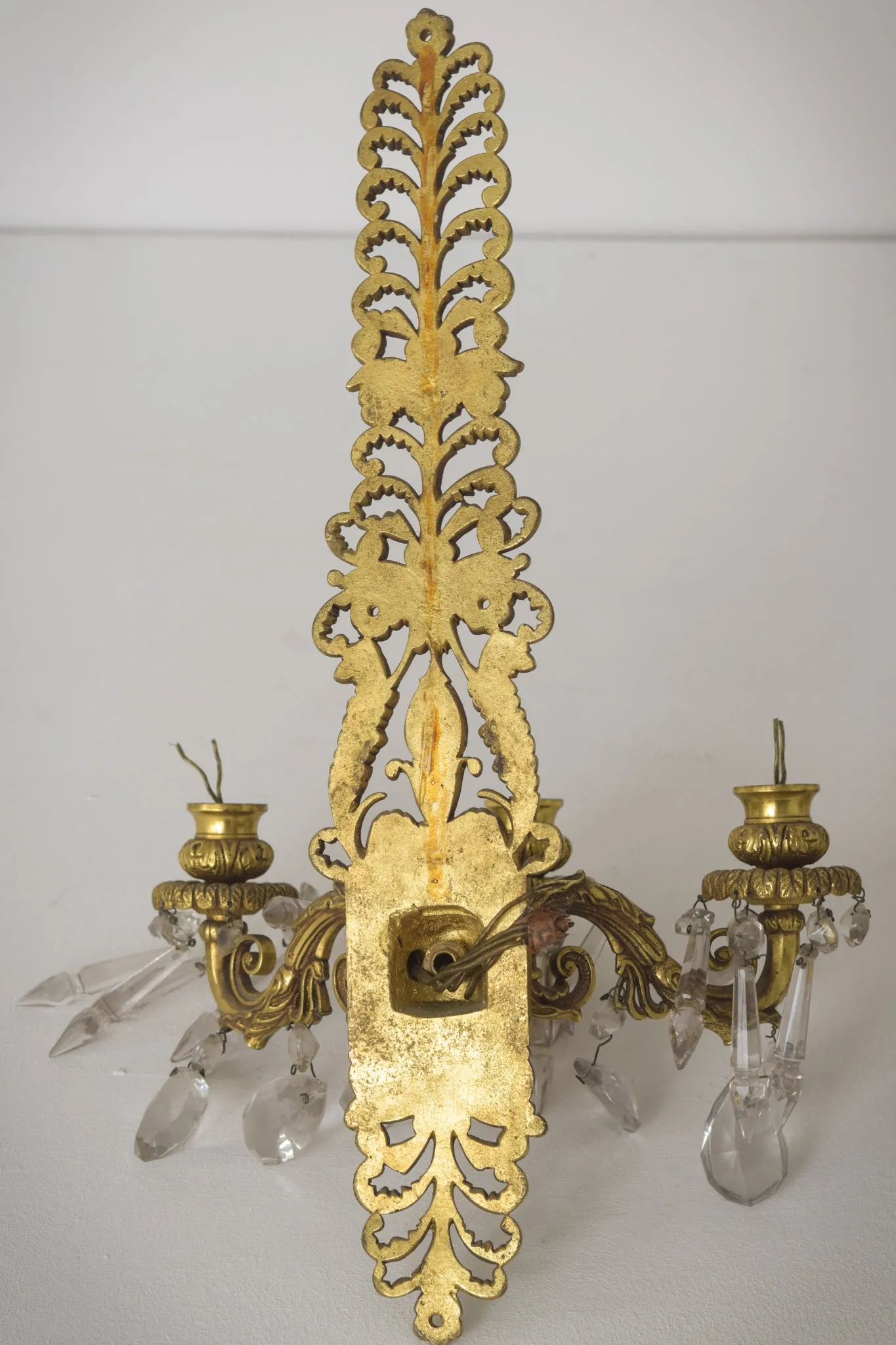 Two - Bronze and Cut Glass Wall-Mounted Chandeliers